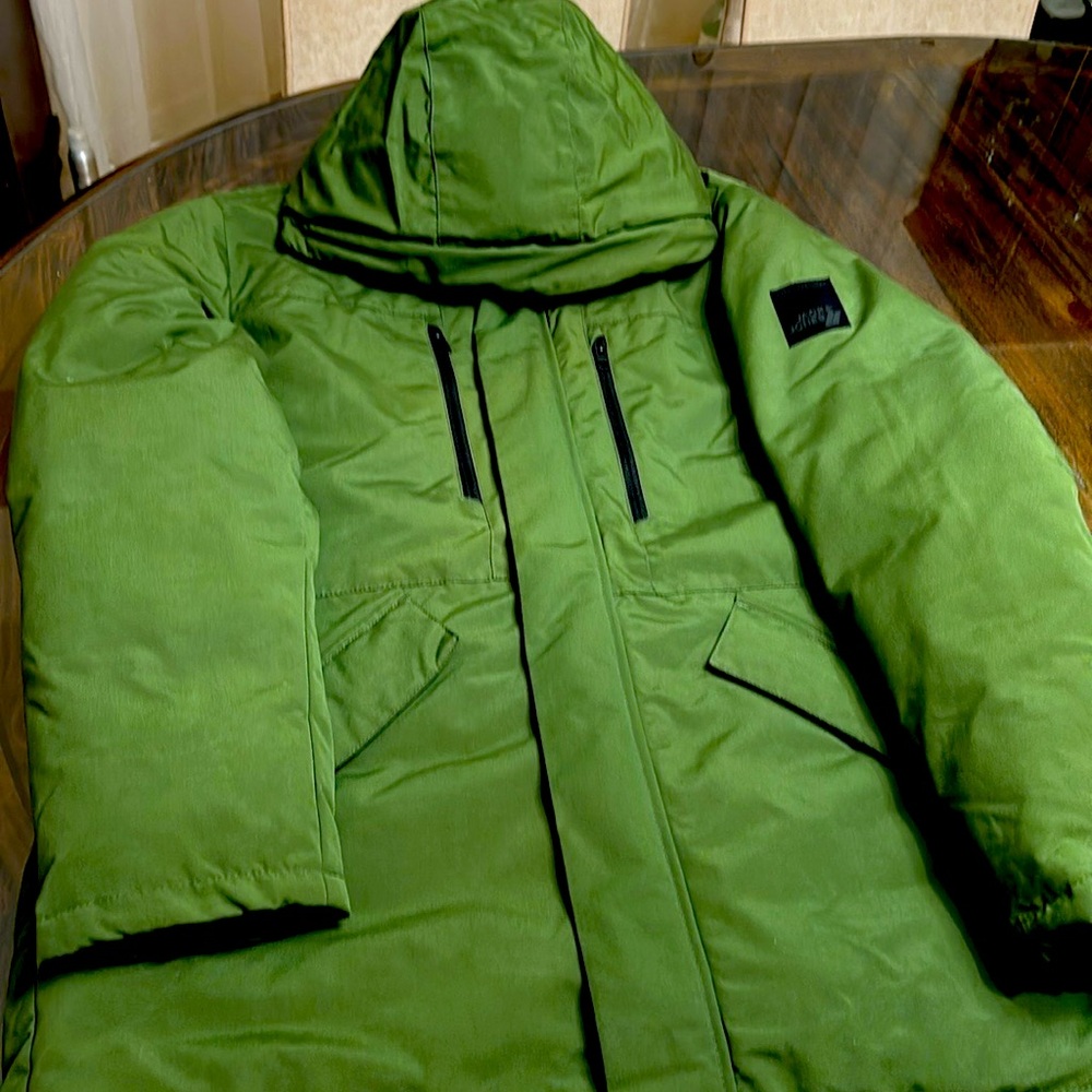 Green Jack and jones men’s coat never worn.